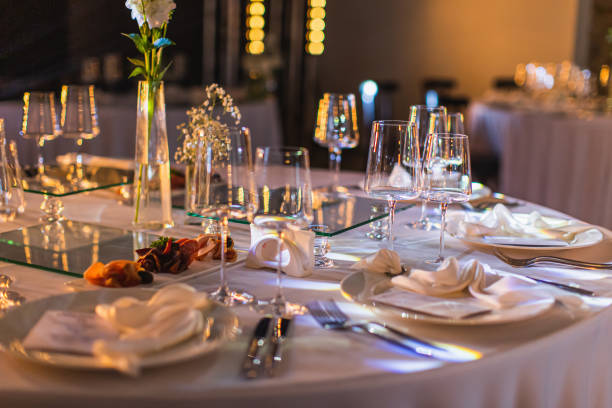 Table setting for event. Catering. Wedding table. Empty glasses stock photo