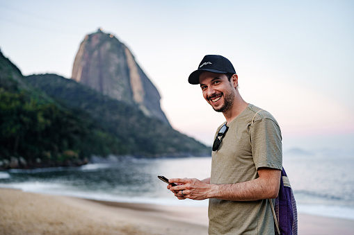 Man using cell phone at Rio de Janeiro