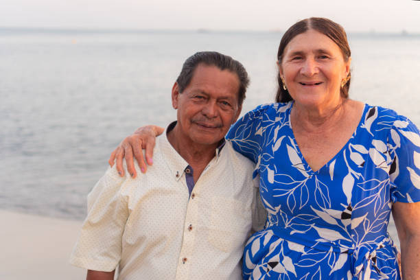 istock Senior couple enjoying seaside moments 1643438290