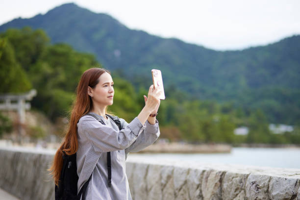 istock Foreign tourists enjoying travel 1643450797