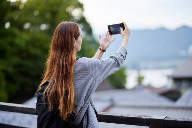 istock Foreign tourists enjoying travel 1643451357
