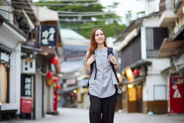 istock Foreign tourists enjoying travel 1643451394