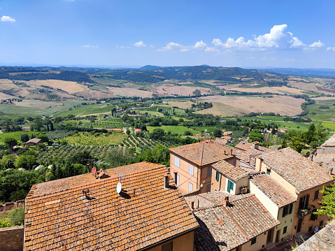 Green landscape viewed from Montepulciano, a medieval and Renaissance hill town in the province of Siena in southern Tuscany.