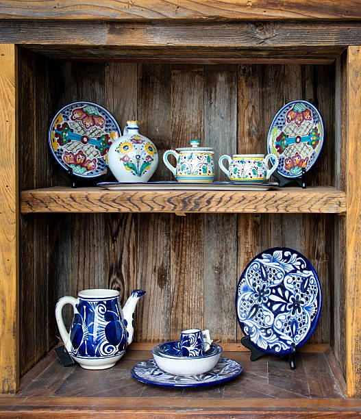 istock Rustic Vintage Cabinet with Colorful Ceramic Plates and Dishes 164349331