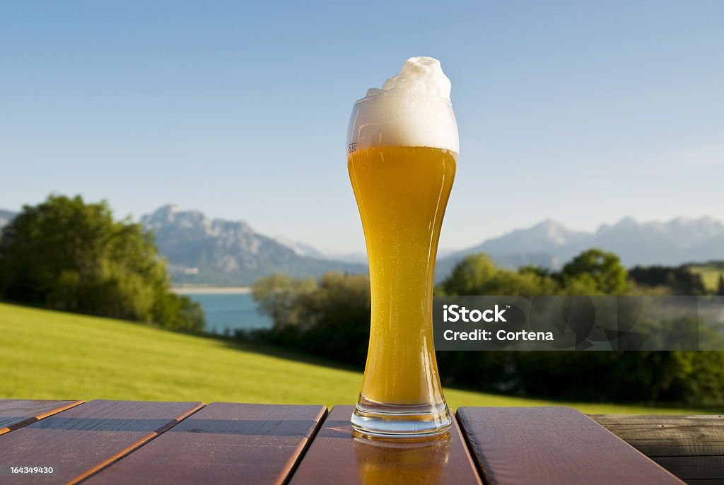 Bavariastyle Bavarian beer and Bavarian mountains. Wheat Beer Stock Photo