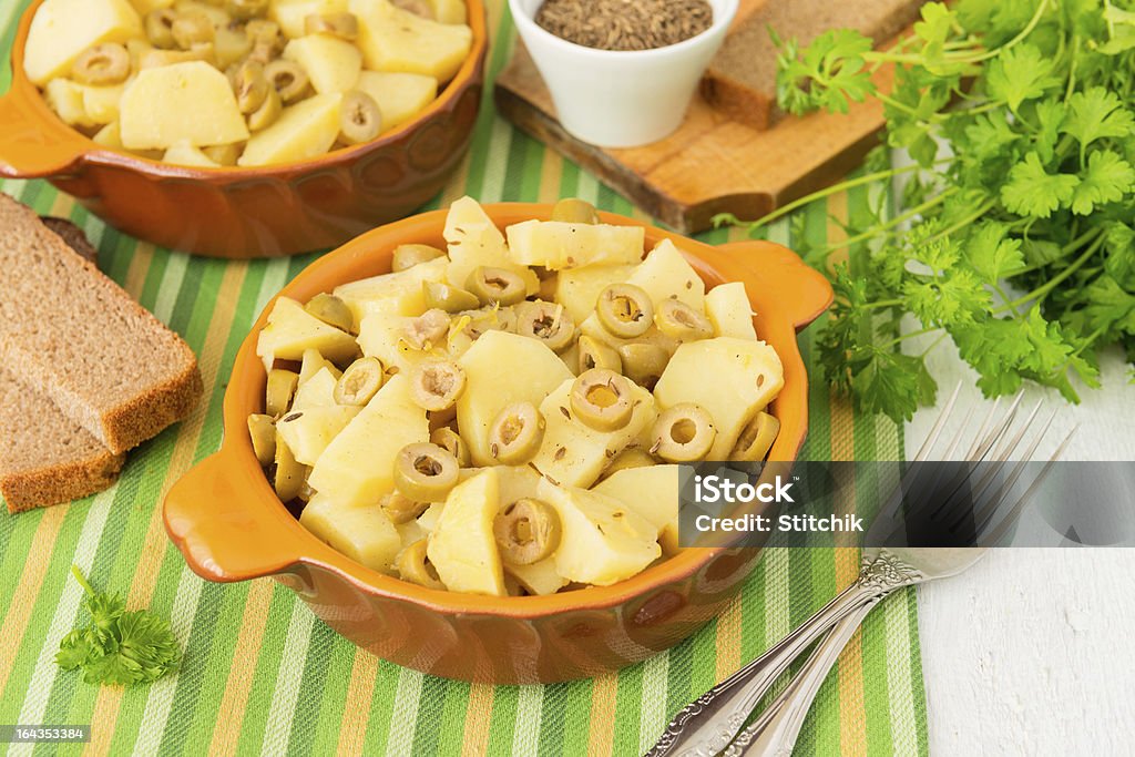 Compotas o papas con aceitunas y comino verde - Foto de stock de Aceituna libre de derechos