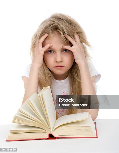 Tired Schoolgirl Learns Lessons Stock Photo - Download Image Now - Adult, Beautiful People, Beauty