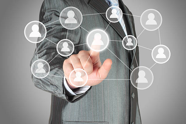 istock Businessman in gray suit using a social media display 164355240