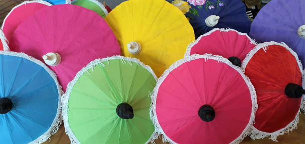 istock Colorful Thai traditional handmade umbrellas background 1643561142