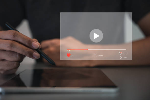 istock Person attending a live webinar on virtual screen streaming online 1643599336
