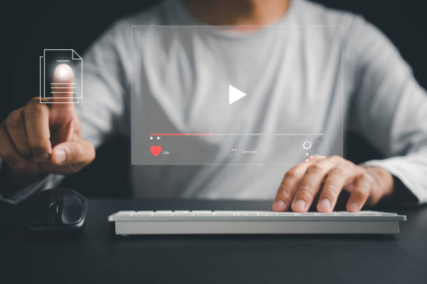 istock Elevate your entertainment experience with a touch as a man's hand interacts with the screen 1643599352