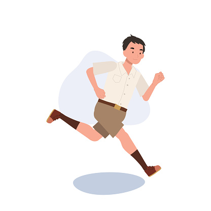 Active School Life concept. Young Thai Student boy in Uniform Running with Joy.