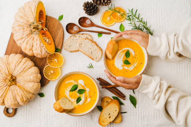 istock Pumpkin Soup with Cream and Bread 1643626438