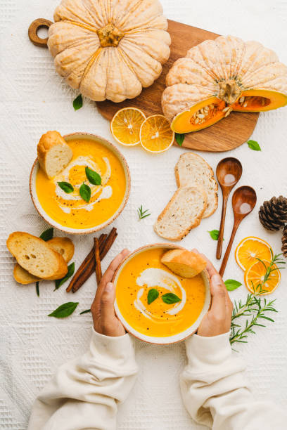 istock Pumpkin Soup with Cream and Bread 1643626448