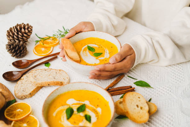 istock Pumpkin Soup with Cream and Bread 1643626454