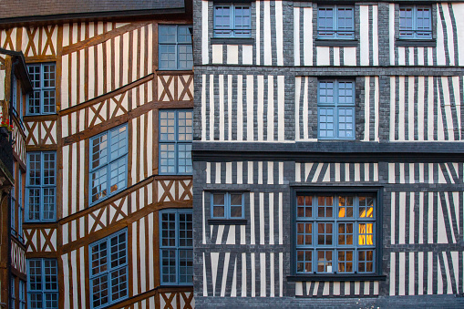 Typical colorful houses with traditional half-timbered architecture well preserved in the historic center of Rouen, Normandy, France