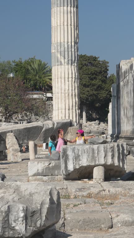 4K video of mother, son and daughter in ancient Greek city ruins