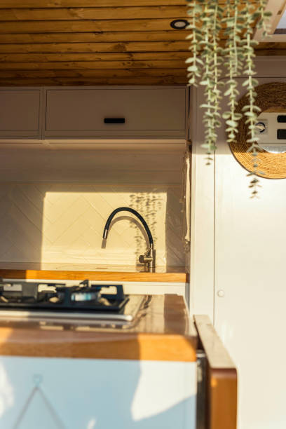 istock Interior of a Nordic-style handcrafted campervan at sunset 1643677442