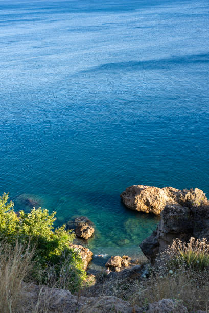 istock Cliffs reaching out to the blue sea 1643680713