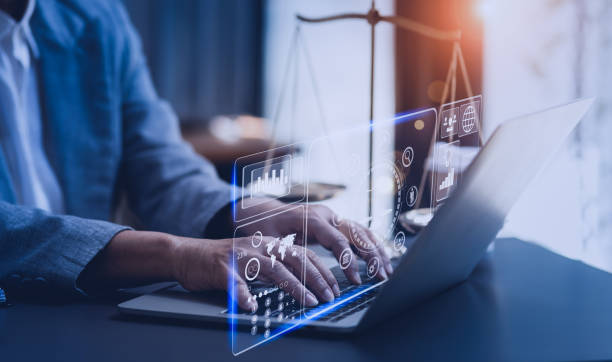 istock Lawyer man using laptop at office desk. 1643690485