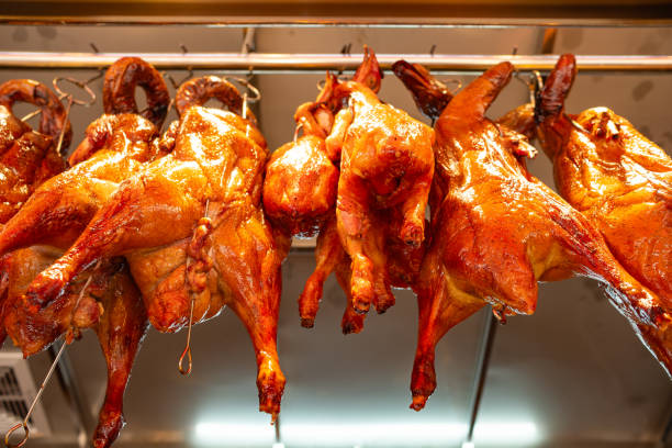 istock low angle view roasted gooses and roasted chicken 1643723775