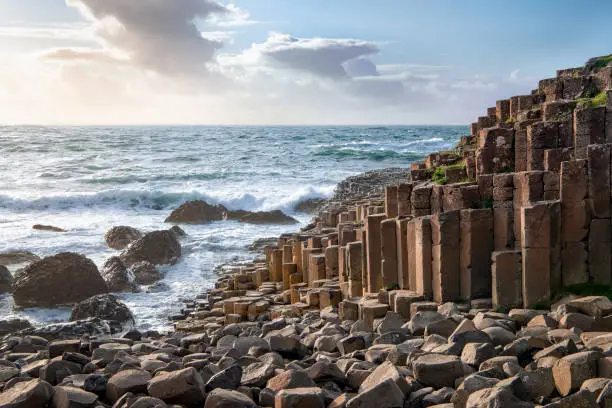 Evening seaside landscape at Giants Causeway in Northern Ireland. Copy space in sky.
