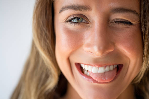 istock Funny face and sticking out tongue 1643820260