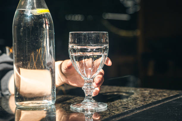 istock Drink water bottle with glass on table in the restaurant. 1643821445