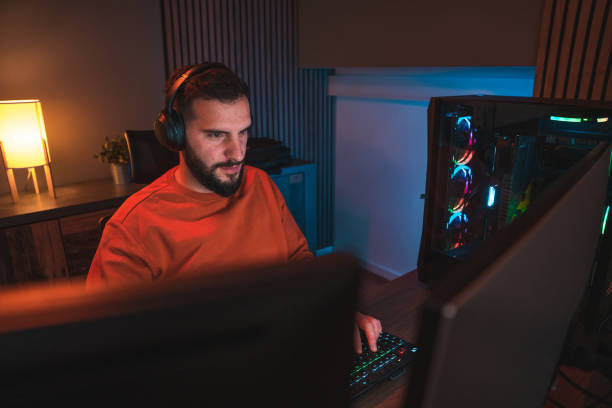 istock Gaming at Night, Caucasian Man Having a Virtual Adventure 1643822574