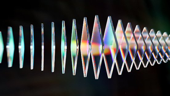 Abstract background Optical - 3d rendered image of glass structure, optical technology, nano electrical wave, dispersion colorful rainbow.  Futuristic energy concept. Science fiction or information technology concept.