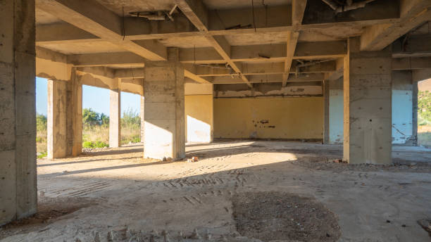 istock Inside the abandoned unfinished building there are large panoramic windows 1643847348