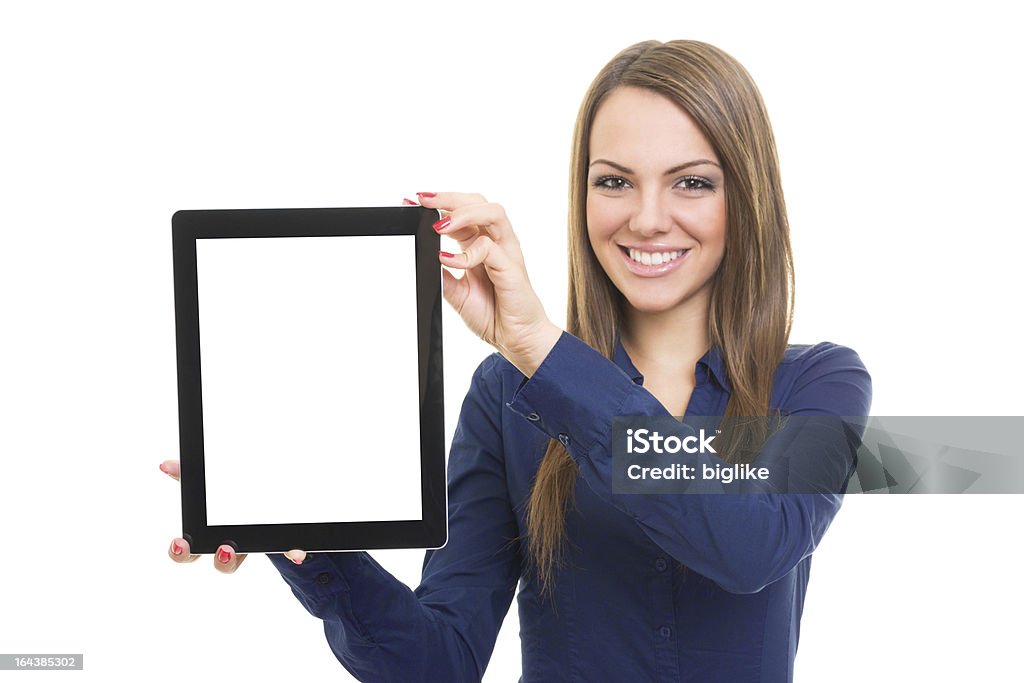 Young woman showing digital tablet computer with blank screen Portrait of a beautiful  young Caucasian woman showing blank digital tablet screen. Isolated on white background. Copy-space available on digital tablet screen. Digital Tablet Stock Photo