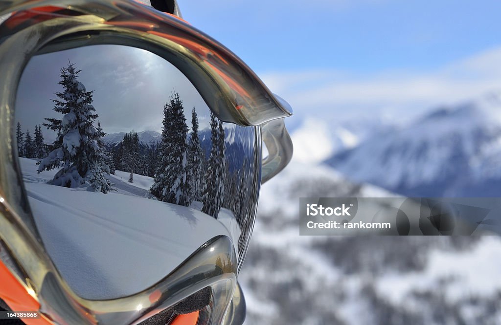 ski mask Reflection of the winter mountain landscape in a ski mask. Selective focus Skiing Stock Photo