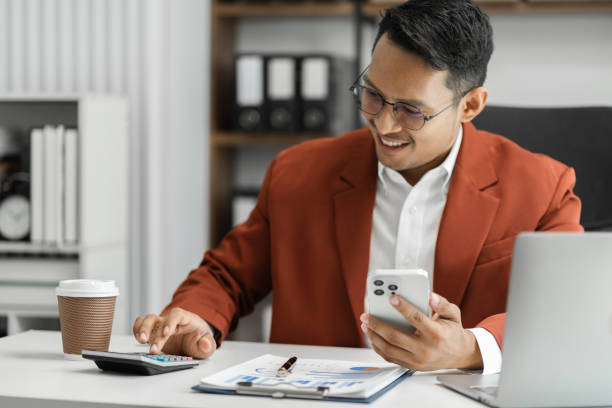 istock Hand man doing finances and calculate on desk about cost at home office. 1643859115