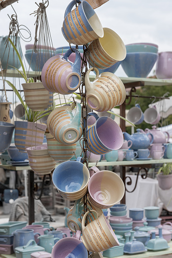 Tea cups. Clay crafting, Stoneware, Earthenware, Ceramic art. Tough and practical, utilitarian ware for the kitchen. Art ware, tableware, decorative ware. Fair of pottery on the city square