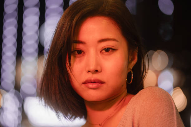 istock City Female Night Portrait 1643937628
