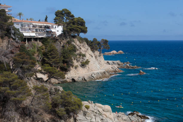 istock Scenic Hotel Overlooking Rocky Beach in Costa Brava, Spain 1643956396