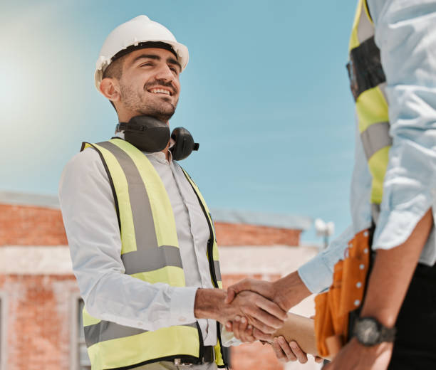 istock Outdoor, men and engineer with handshake, greeting and agreement with welcome, hello and partnership. Shaking hands, male people and teamwork with collaboration, architecture and construction project 1643968333