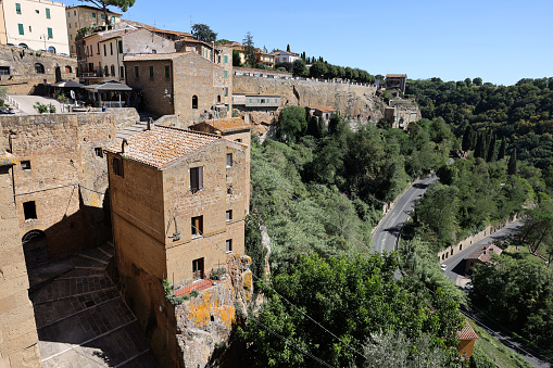 Pitigliano, Italy - September 13, 2022:  Pitigliano - the picturesque medieval town founded in Etruscan time on the tuff hill in Tuscany, Italy.