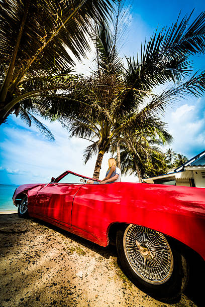 istock Young happy couple with old style car 164397806