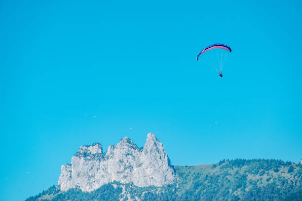 istock Skydiver high in the air above Annecy 1643979042