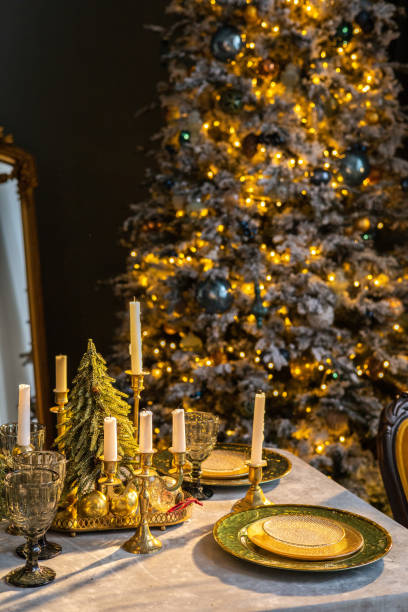 istock Beautiful table setting with Christmas decorations in living room 1643982881