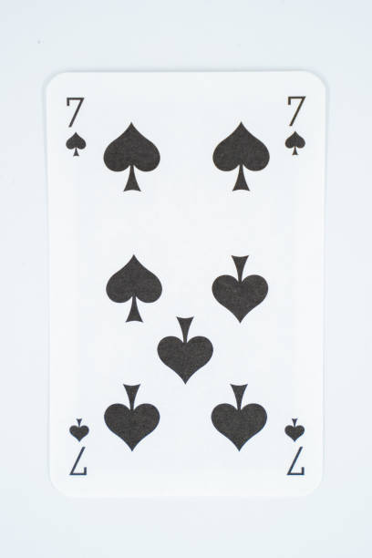 istock Seven of spades on white background. 1643987601