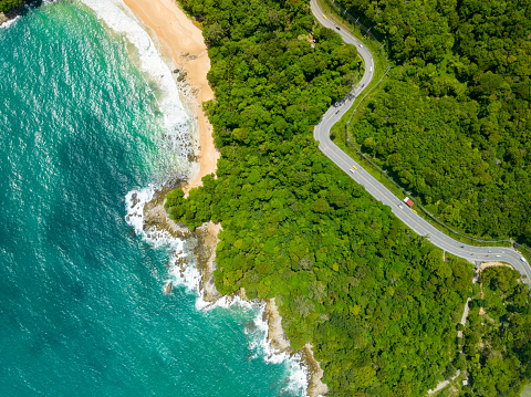 Aerial view seashore with mountains at Phuket Thailand, Beautiful seacoast view at open sea in summer season, Nature recovered Environment and Travel background