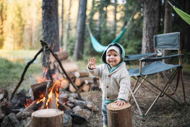 istock Happy baby boy on camping in nature. 1644005315