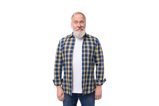 portrait of successful healthy 50s mid aged gray-haired retired man with mustache and beard on white background.