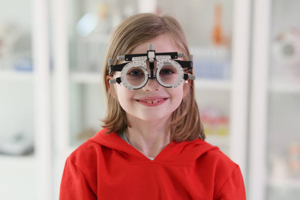 istock Girl wears goggles for eyesight correction looking in camera 1644006289