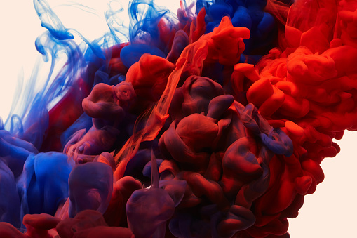 Splash of blue and red paint. Abstract background