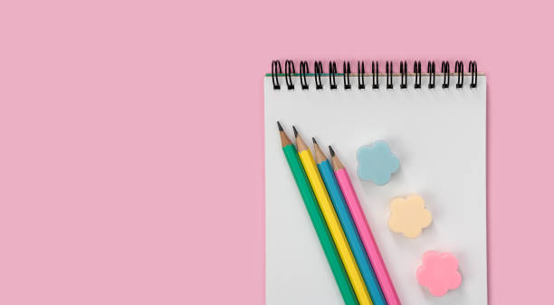 istock Flatlay composition with school stationery on a pink background. Back to school. Copy space. Top view. 1644054549