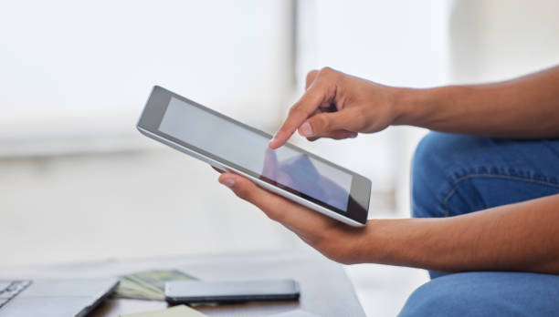 istock Hands, tablet and scroll, social media and app with communication, internet and connection. Wireless technology, touchscreen and person typing, paperless and digital with website and research online 1644071016
